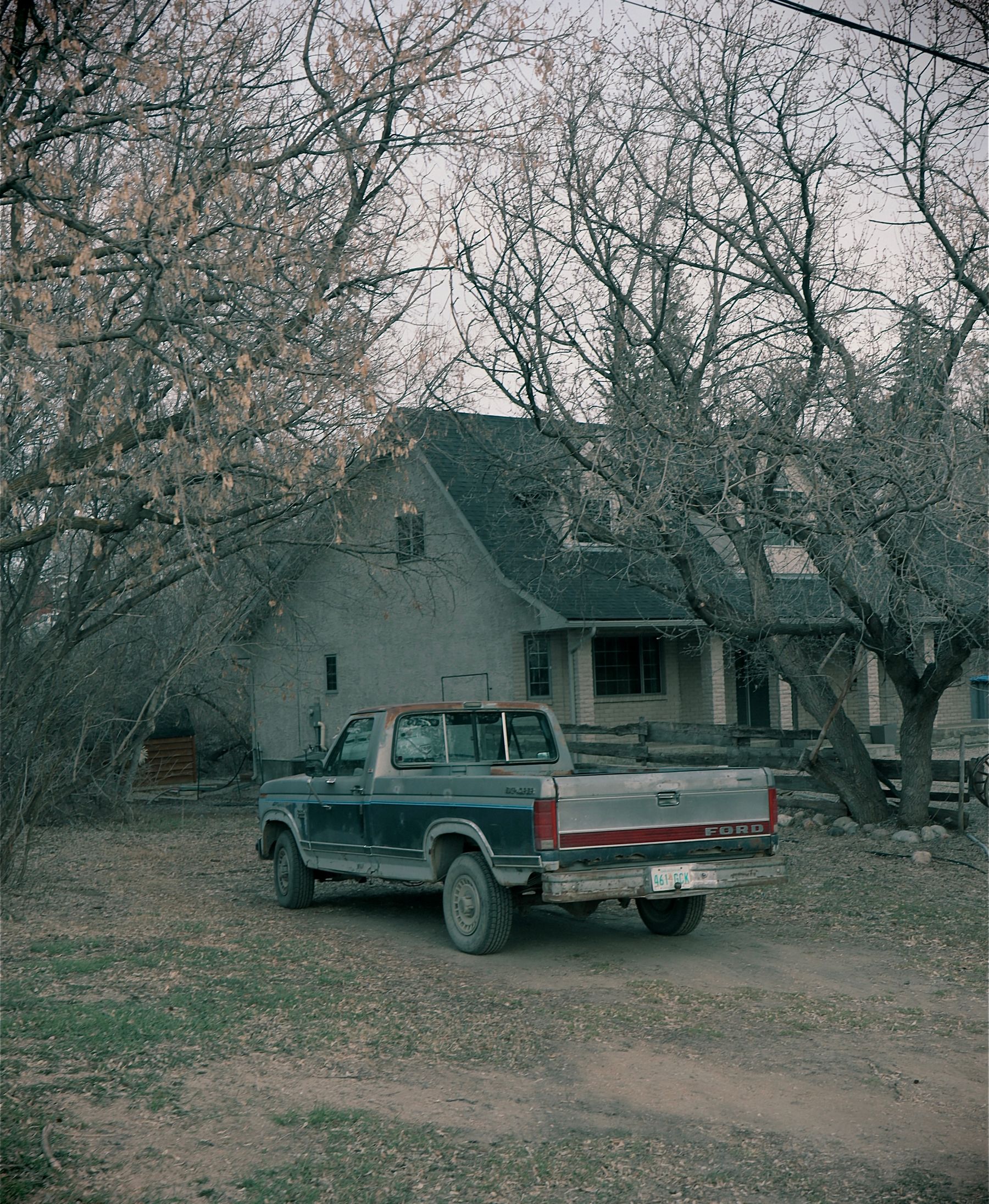 Pickup truck parked at a rural property